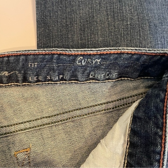 Eddie Bauer Curvy Bootcut Flare Stretch Dark Wash Women's Jeans; 10 - Picture 4 of 9